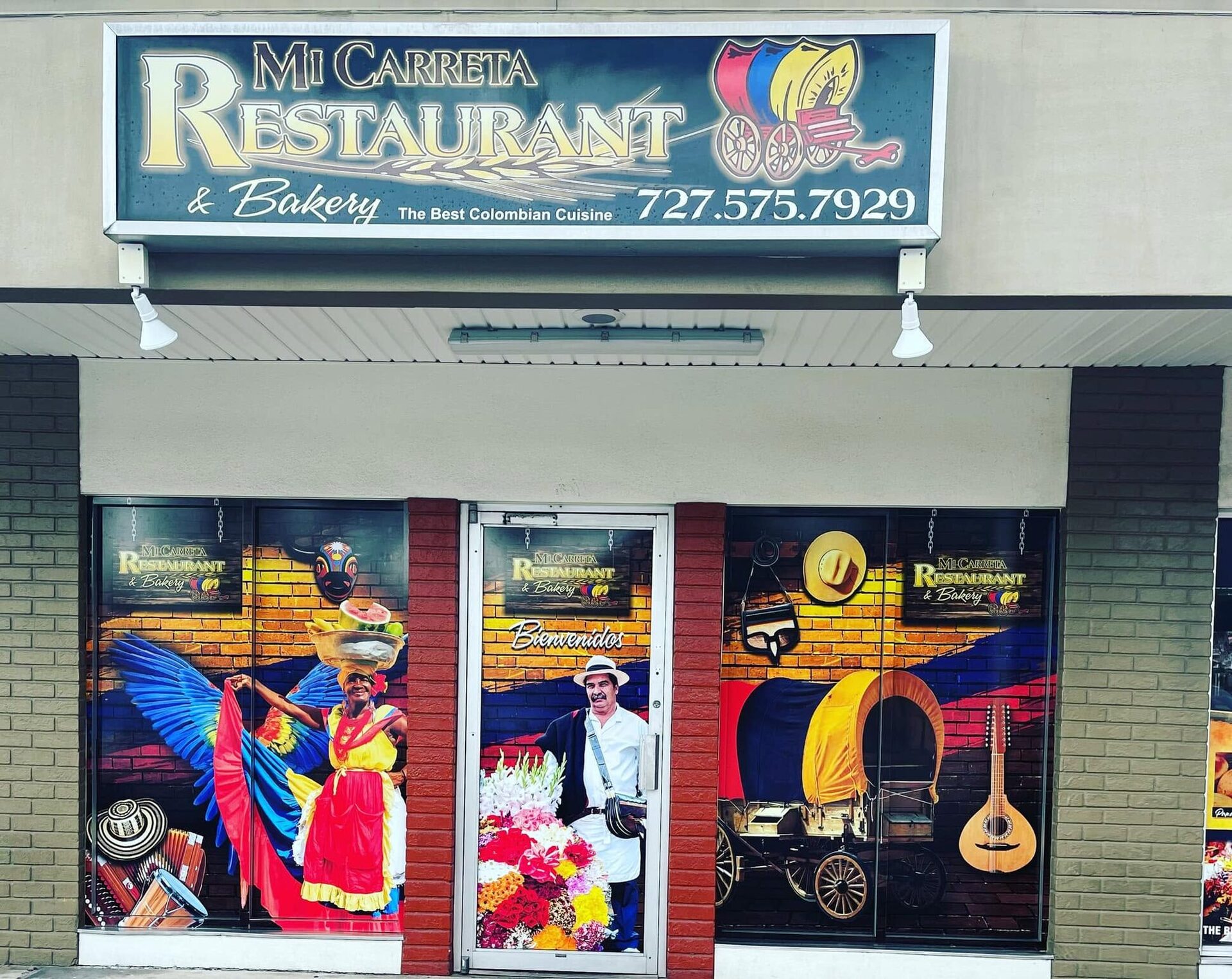 The Mi Carreta Restaurant & Bakery storefront on 54th Ave N in St. Petersburg, with painted window murals