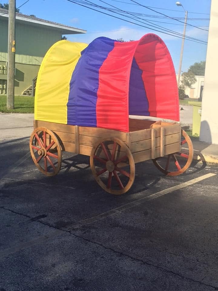 The flag-colored wagon parked out front