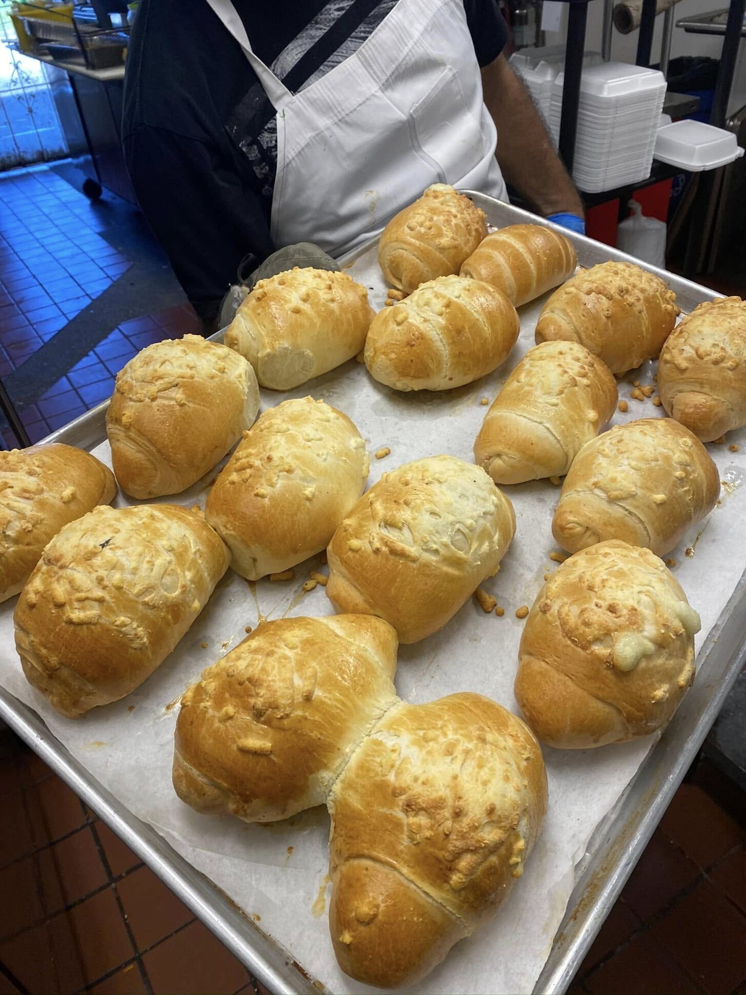 A tray of cheese-filled rolls fresh from the oven