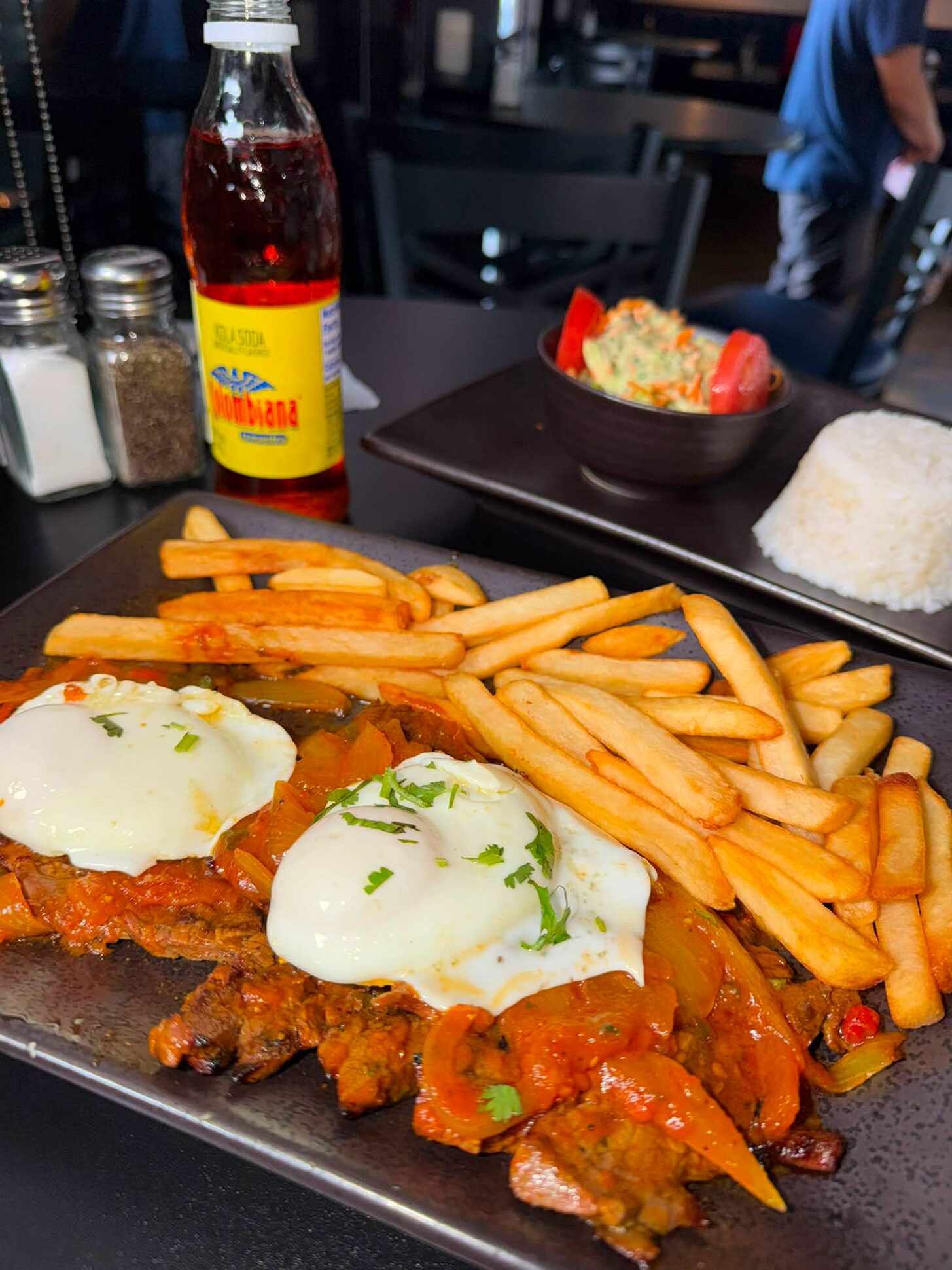 Bistec a caballo with two fried eggs and French fries
