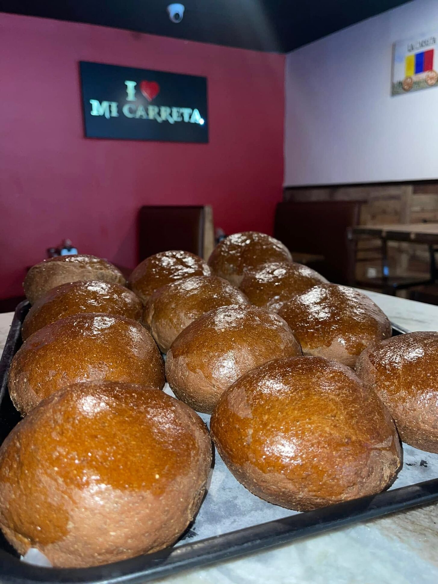 Glossy sweet breads on a tray