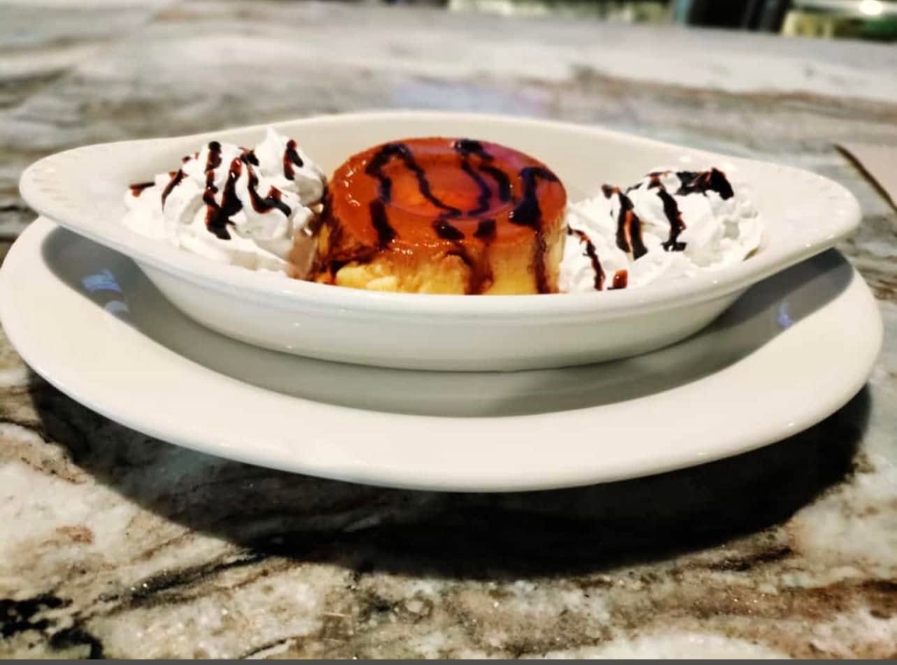 Caramel flan with whipped cream